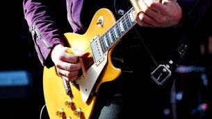 <p>Guitar-playing live in Nashville. Credit: Donn Jones.</p>